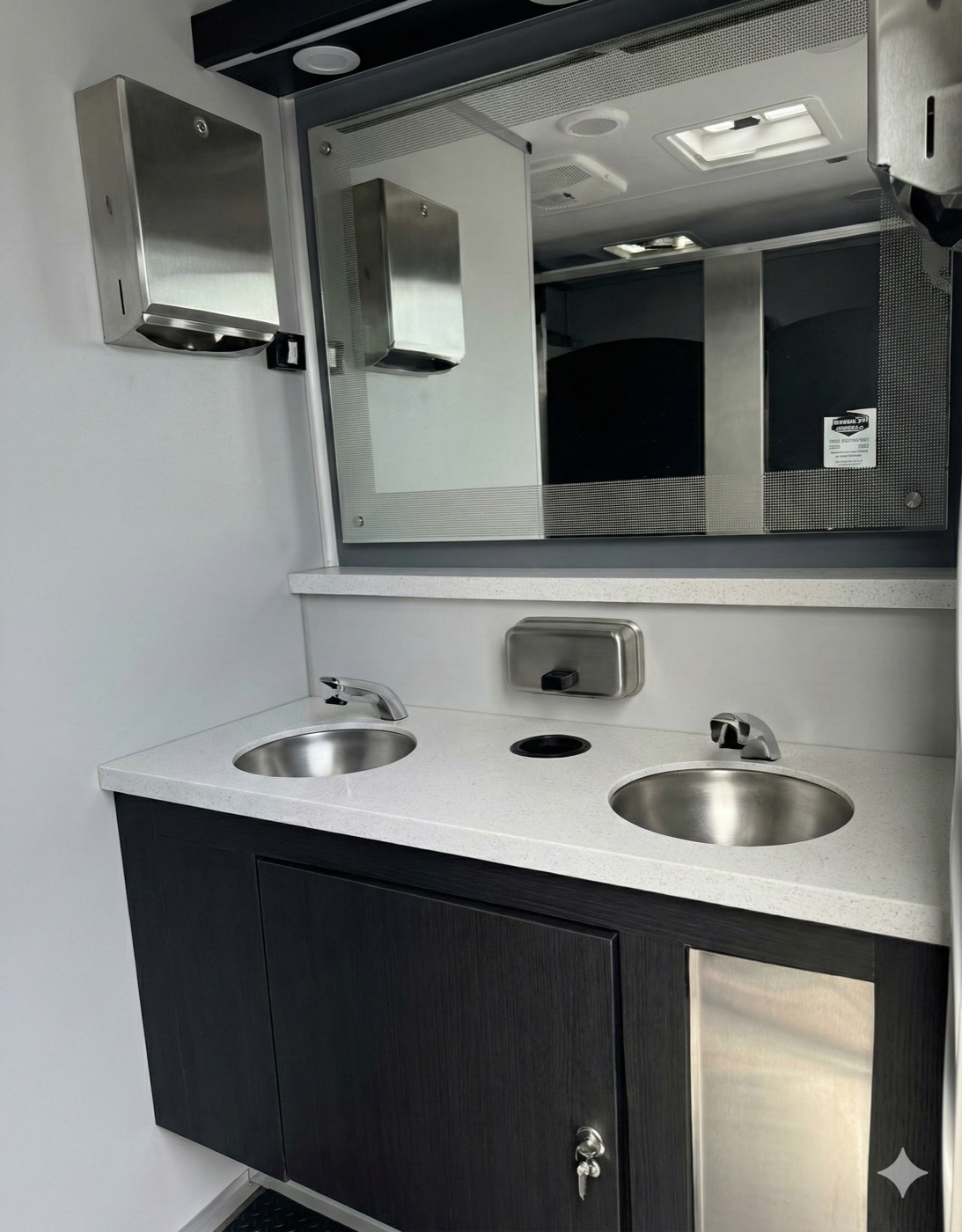 Dual stainless sinks with quartz countertop and chrome faucets
